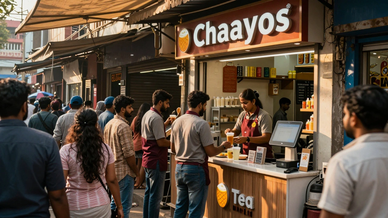 Customers lining up at a Chaayos tea kiosk in a busy Indian market